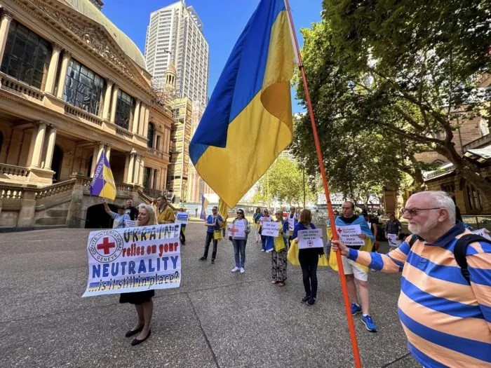 Australian activists protest at the Australian office of the Red Cross.